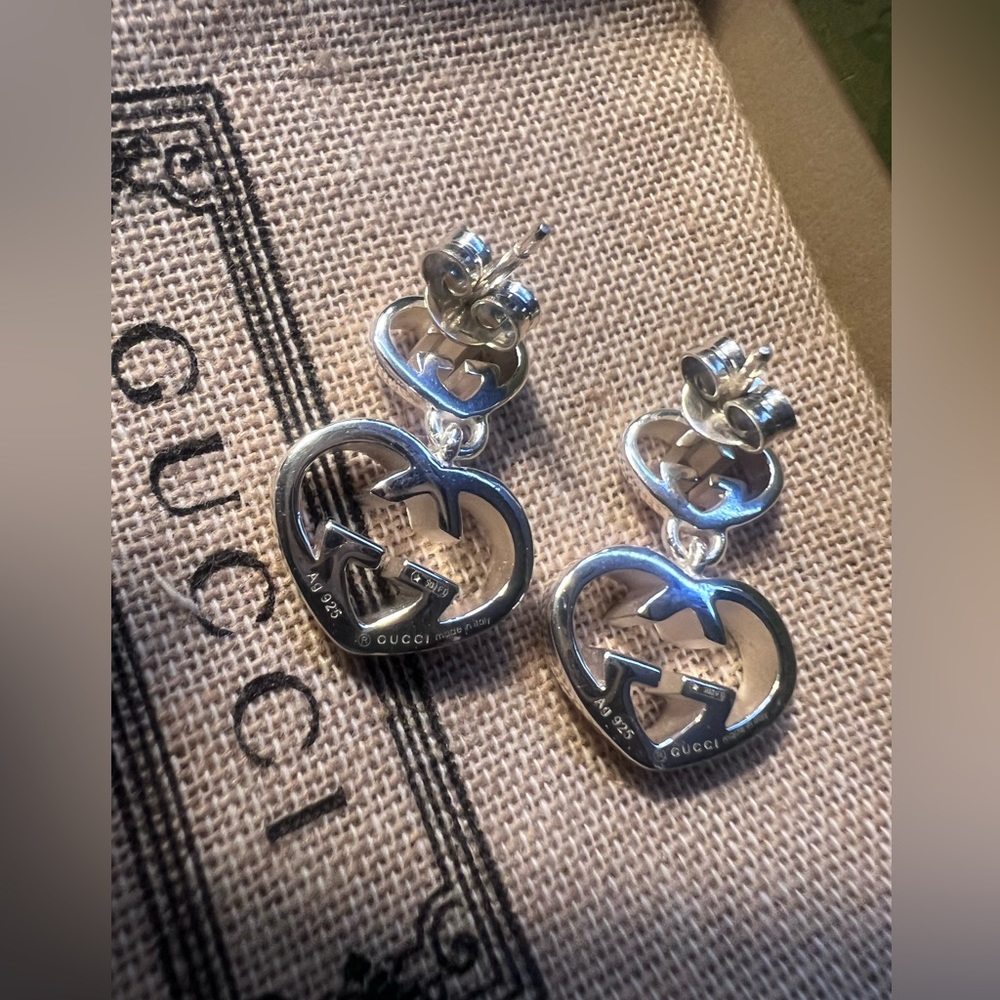 Gucci Britt double G heart drop earrings.